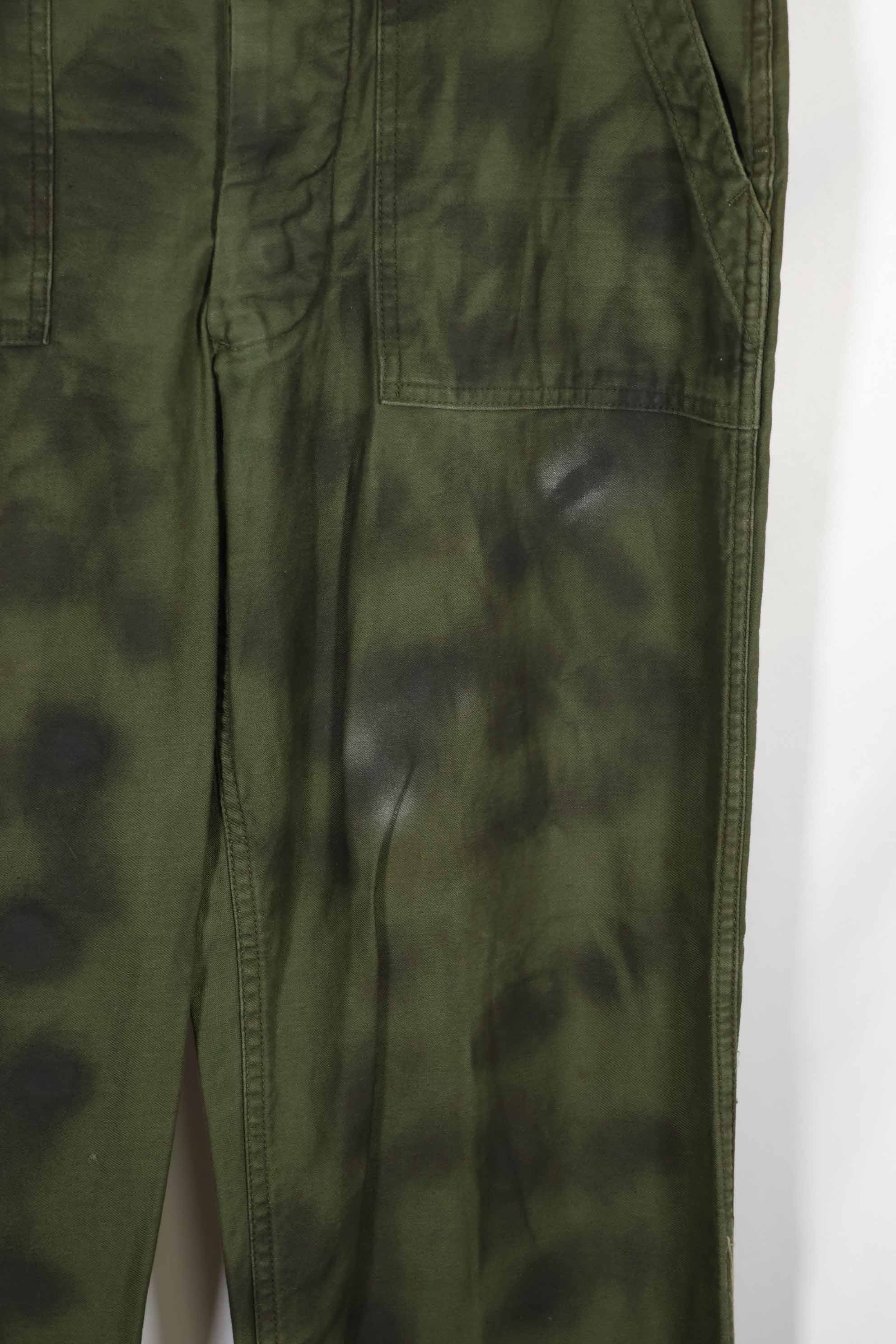 Real 1960s lot OG-107 baker pants, hand painted camouflage, used.