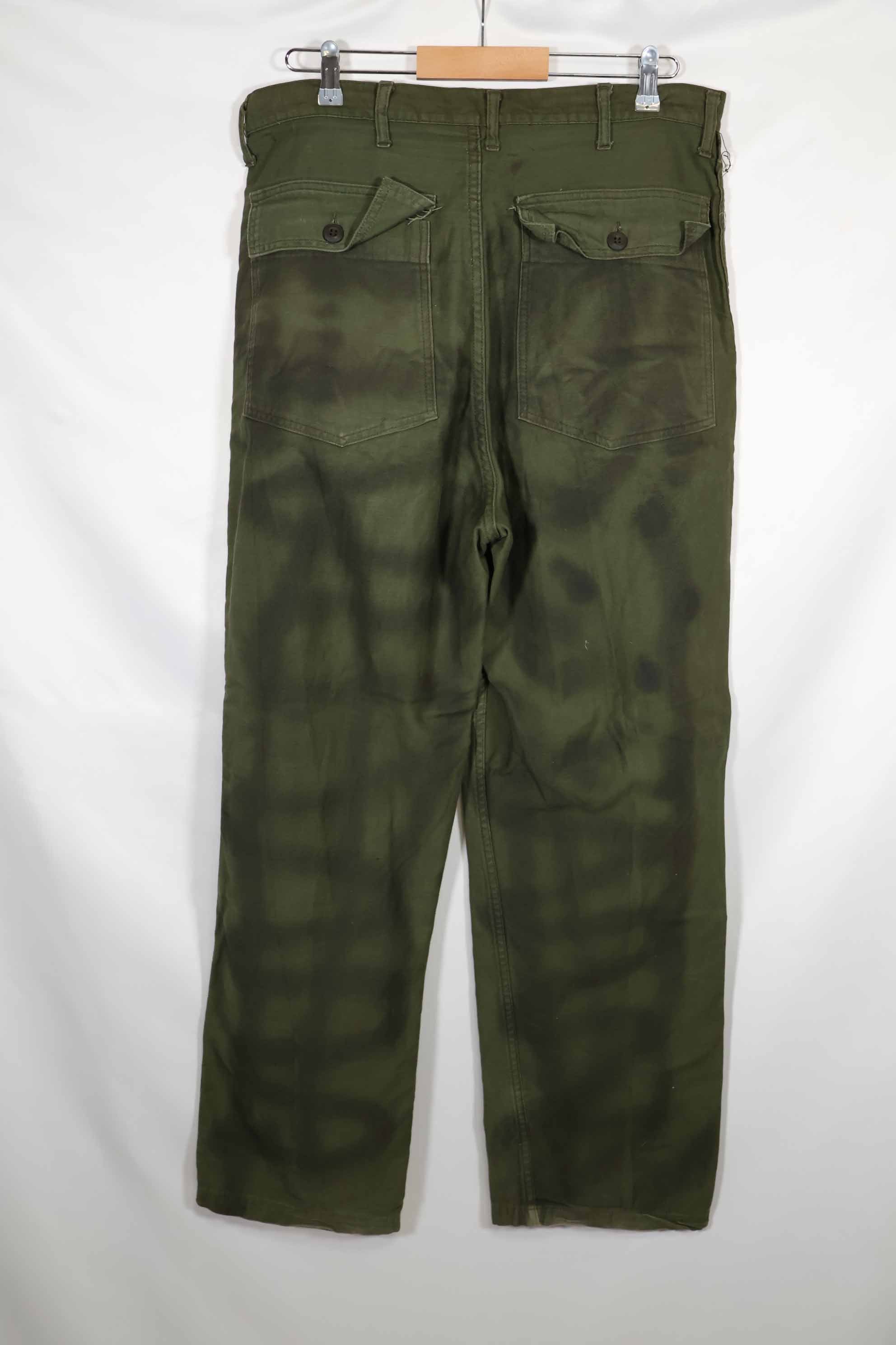 Real 1960s lot OG-107 baker pants, hand painted camouflage, used.