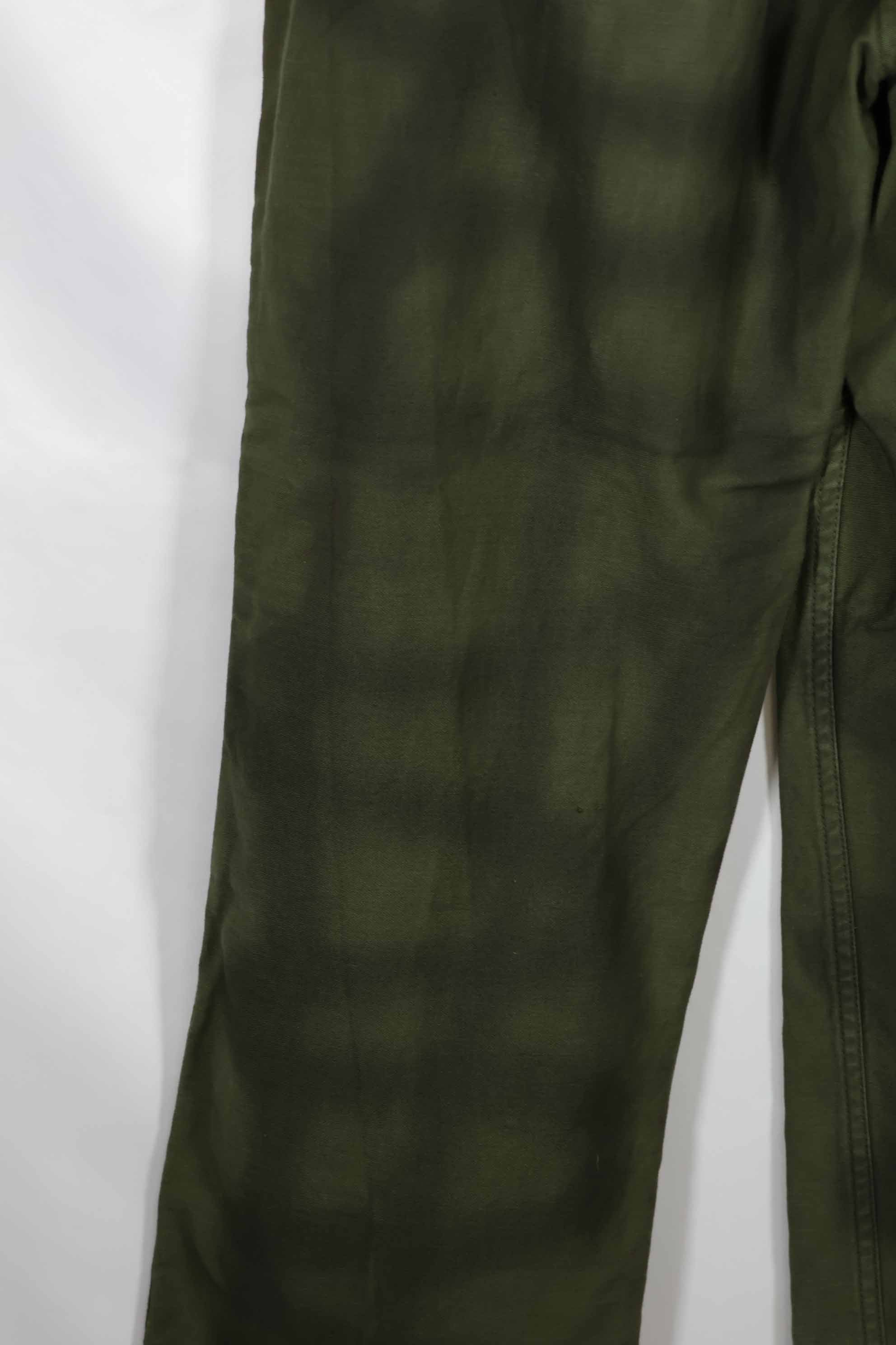 Real 1960s lot OG-107 baker pants, hand painted camouflage, used.