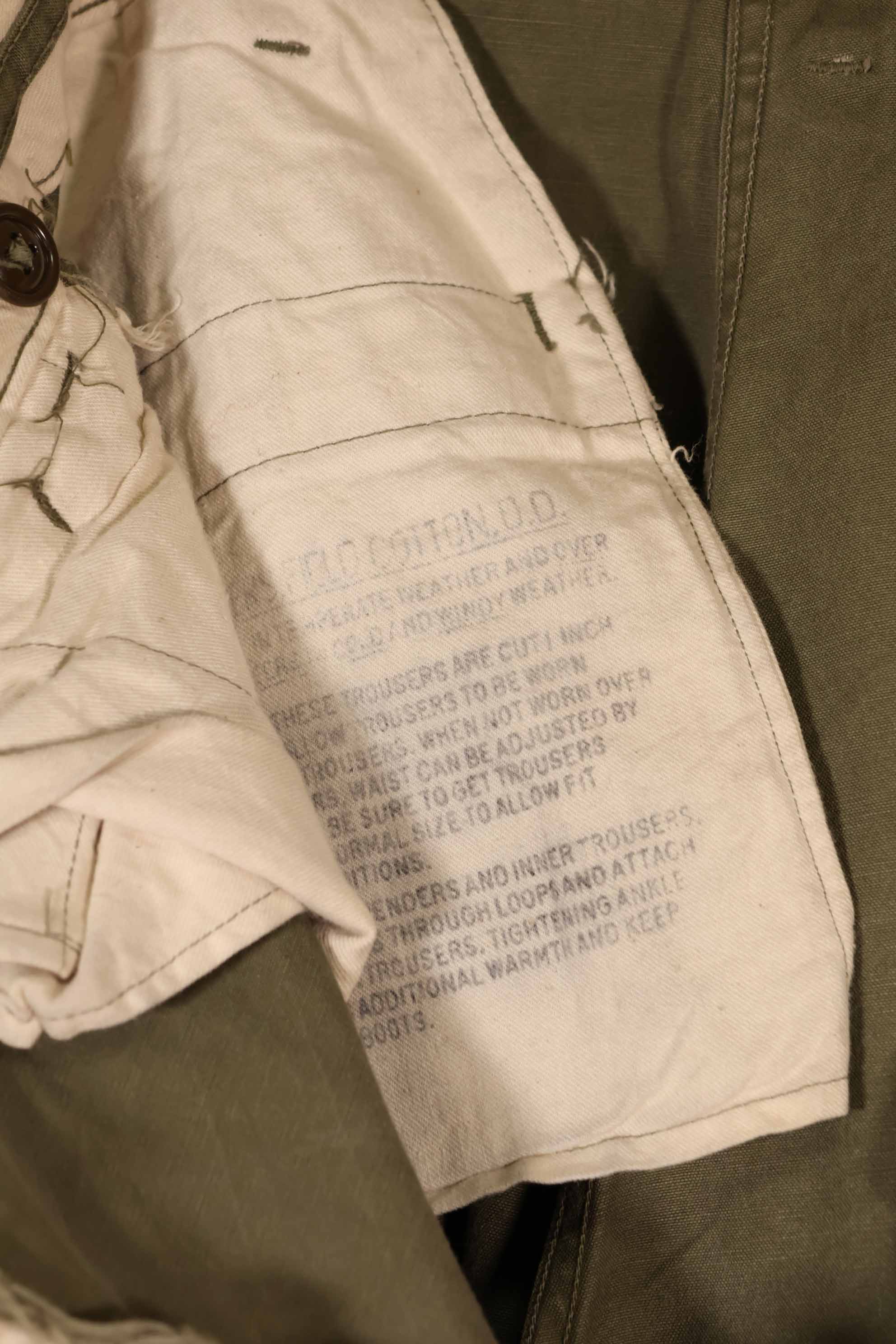 Real late 1940s - early 1950s M45 OD cotton field pants, used, strong signs of use.