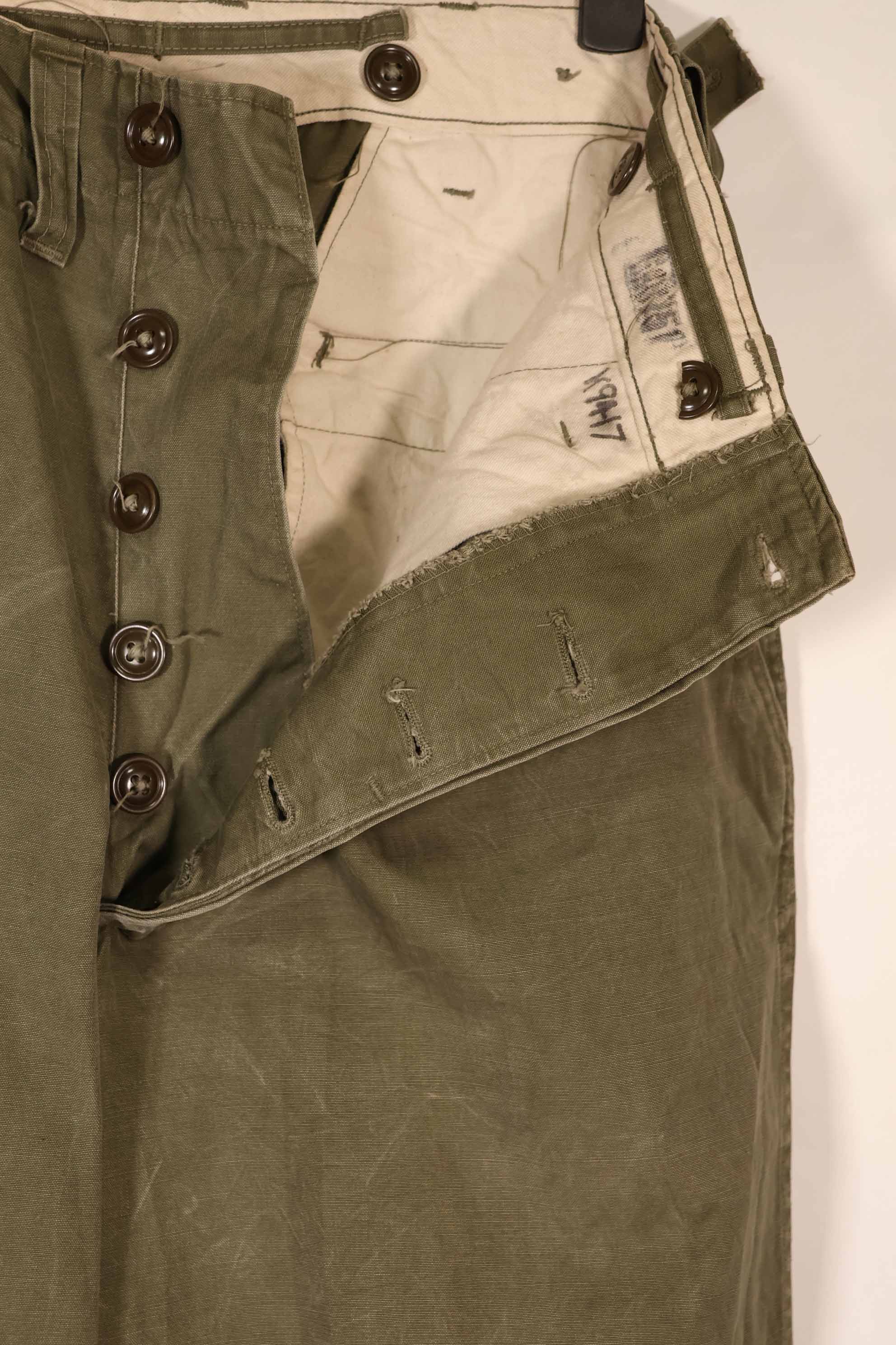 Real late 1940s - early 1950s M45 OD cotton field pants, used, strong signs of use.