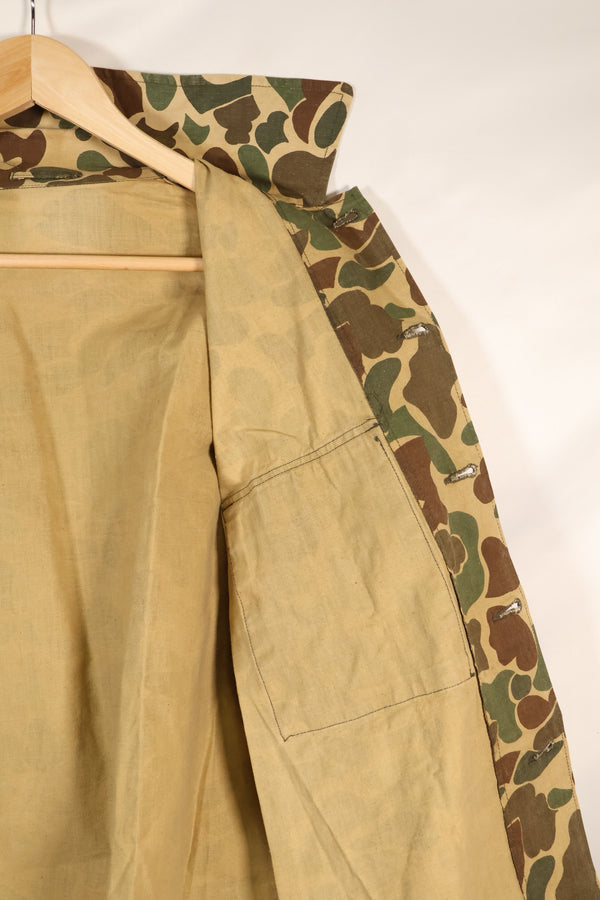 1970's manufactured in Okinawa, Japan, Beogum camouflage duck hunter hunting shirt, used.