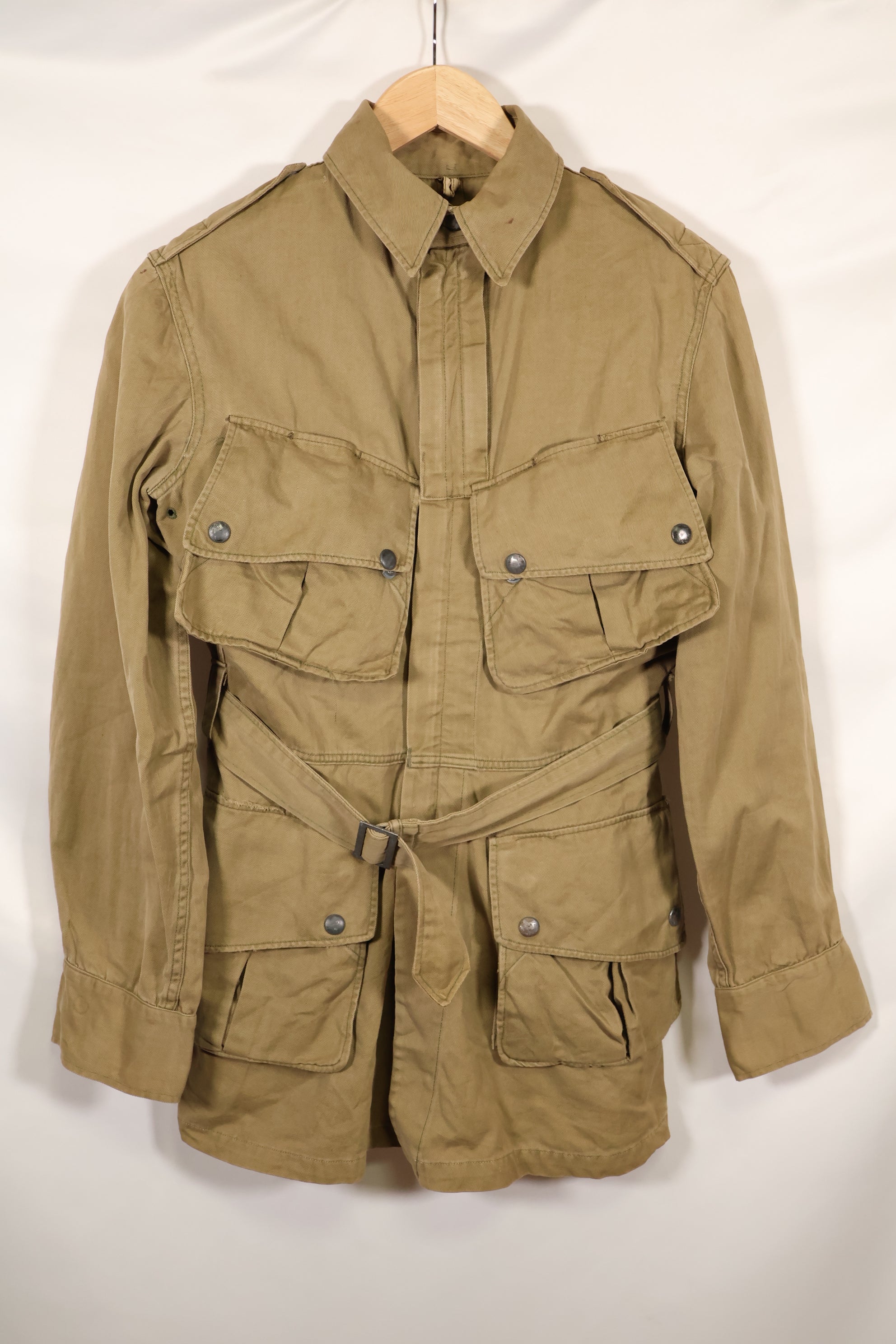 1940s estimated 38 M1942 Airborne jump jacket with button corrosion, good condition, used.