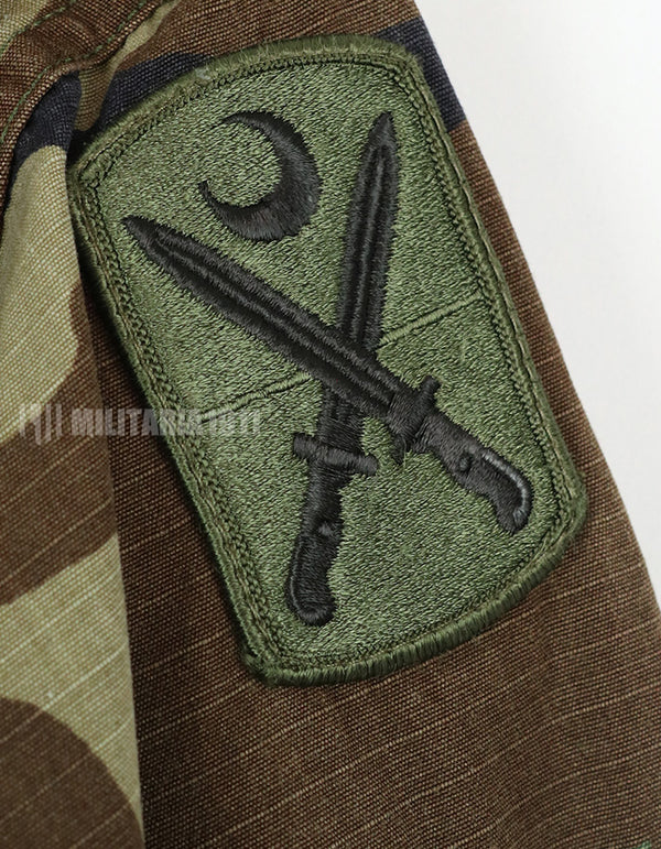 Real U.S. Army Woodland Camouflage Jacket, 2007, with patches.