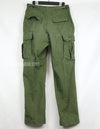 Original 2nd model Jungle Fatigue pants, non-ripstop, worn, scratched, faded. Scuffed, faded